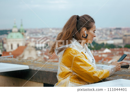pensive woman in blouse in Prague Czech Republic 111044401