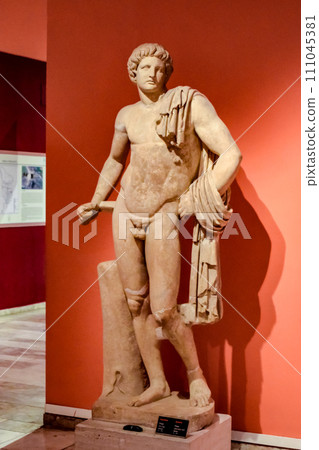 Marble statues of gods and emperors of antiquity in the Museum of Antiquities of Antalya, Turkey. 111045381