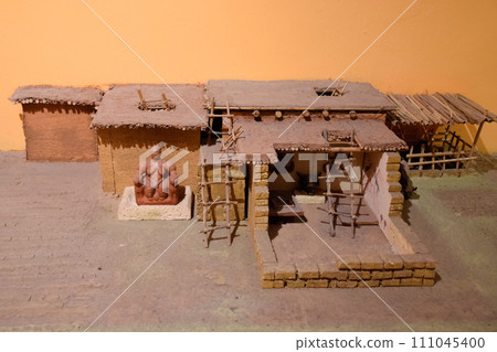 Modeling of ancient ancient buildings of man. Room with modeling in the Museum of Antalya 111045400