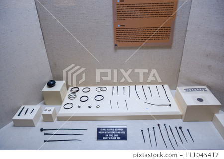 Vintage sewing needles. Exhibits of the museum of antiquities in Antalya. Vintage sewing needles. Exhibits of the museum of antiquities in Antalya. 111045412