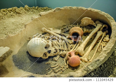 Burial in a jug. Antalya Museum, the exhibit of human burial in a clay jug. 111045429