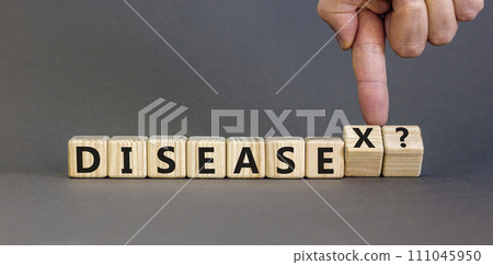 Disease X after covid symbol. Turned cubes and changed the word Disease to Disease X. Beautiful grey table grey background. Doctor hand. Medical, Disease X after covid concept. Copy space. Disease X after covid symbol. Turned cubes and changed the word Disease to Disease X. Beautiful grey table grey background. Doctor hand. Medical, Disease X after covid concept. Copy space. 111045950