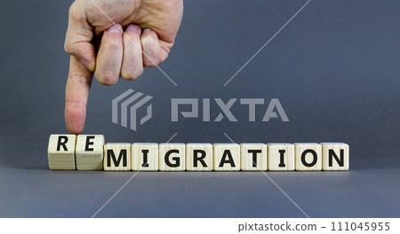 Migration or remigration symbol. Concept word Migration Remigration on beautiful wooden cubes. Beautiful grey background. Businessman hand. Business migration or remigration concept. Copy space. 111045955