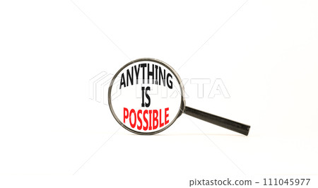 Anything is possible symbol. Concept words Anything is possible in beautiful magnifying glass. Beautiful white table white background. Business anything possible concept. Copy space. Anything is possible symbol. Concept words Anything is possible in beautiful magnifying glass. Beautiful white table white background. Business anything possible concept. Copy space. 111045977