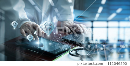 A doctor using a tablet computer to search for a location. A doctor using a tablet computer to search for a location. 111046290