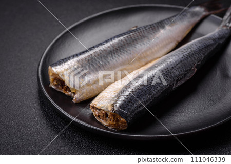 Pacific herring fillet marinated with salt, spices and herbs 111046339