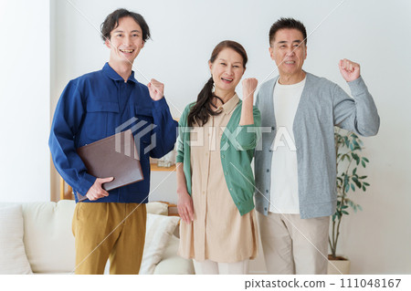 Portrait of a man and a senior couple wearing work clothes 111048167