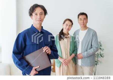 Portrait of a man and a senior couple wearing work clothes 111048169