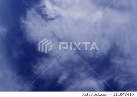 Rich blue sky with white clouds. 111048410