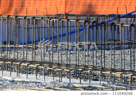 Image of underground beams with concrete poured to the bottom of the first floor slab 111049266