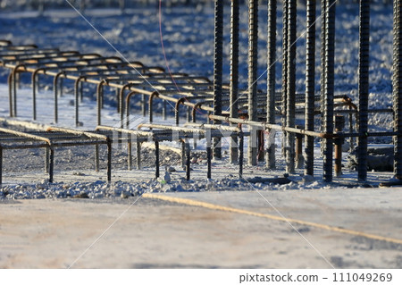 Image of underground beams with concrete poured to the bottom of the first floor slab 111049269