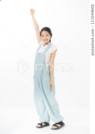 young woman wearing overalls young woman wearing overalls 111049608