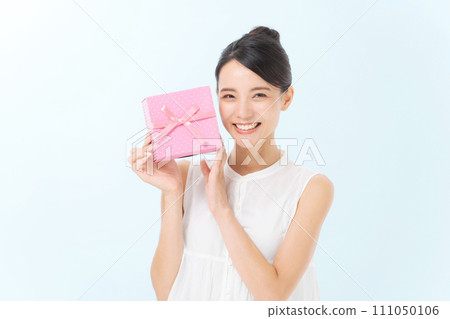 A woman with a present A woman with a present 111050106
