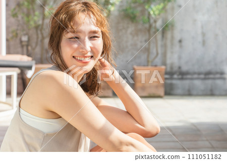 Image of a woman using skin care, lotion, serum, emulsion, sunscreen, and basic cosmetics Image of a woman using skin care, lotion, serum, emulsion, sunscreen, and basic cosmetics 111051182