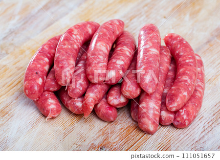 Raw sausages for frying 111051657
