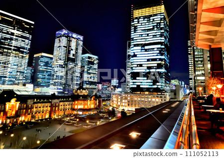 Night view of illuminated Tokyo Station Marunouchi skyscrapers 111052113
