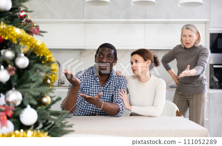 Elderly woman quarreling with couple man and woman Elderly woman quarreling with couple man and woman 111052289