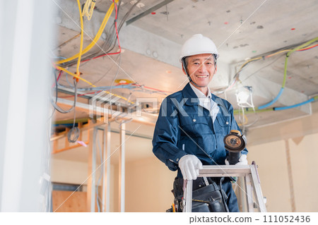 carpenter working on site carpenter working on site 111052436