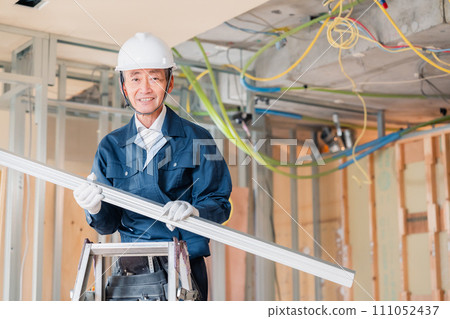 carpenter working on site carpenter working on site 111052437
