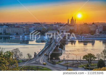 Budapest Hungary, city skyline sunrise at Danube River with Chain Bridge and St. Stephen's Basilica Budapest Hungary, city skyline sunrise at Danube River with Chain Bridge and St. Stephen's Basilica 111053846
