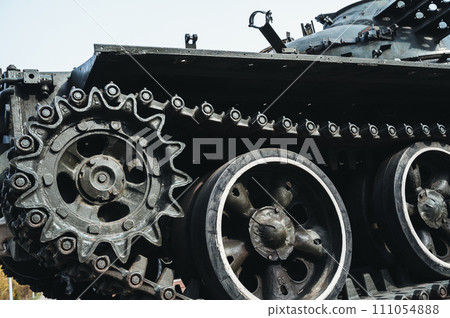 metal old caterpillar track tank of military army metal heavy Soviet tank in close-up metal old caterpillar track tank of military army metal heavy Soviet tank in close-up 111054888