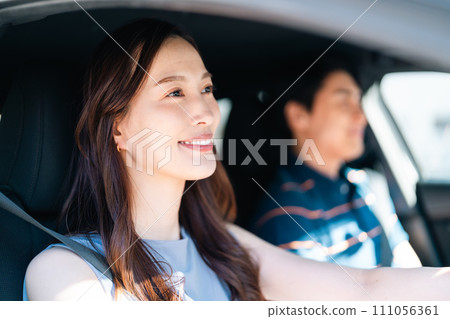 young couple enjoying a drive young couple enjoying a drive 111056361