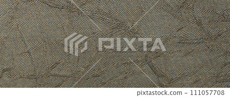 Texture of dark brown color background from textile material with wicker pattern, macro. Vintage umber fabric 111057708