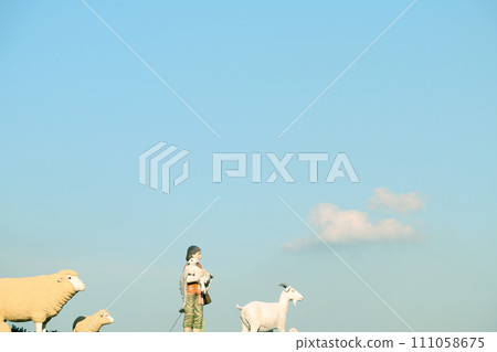 boy, goat and sheep 111058675