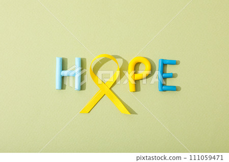 The inscription hope with a yellow ribbon The inscription hope with a yellow ribbon 111059471