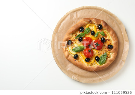 Freshly baked vegetable galette on a white background Freshly baked vegetable galette on a white background 111059526