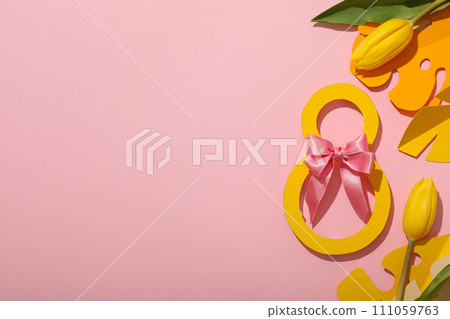 Paper figure eight with a beautiful satin bow Paper figure eight with a beautiful satin bow 111059763