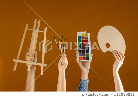 The tools of the artist in the hands of women. The tools of the artist in the hands of women. 111059831