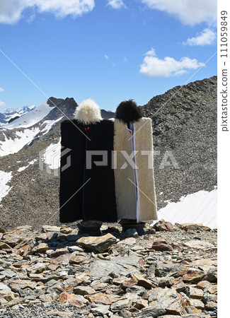 Traditional Caucasian sheepskin costumes in the Dombay Mountains, Russia 111059849