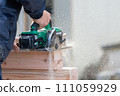 Carpentry work using a circular saw 111059929