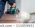 Carpentry work using a circular saw 111059931