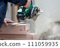 Carpentry work using a circular saw 111059935