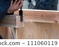 Carpentry work with a chisel 111060119