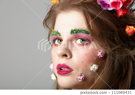 Portrait of a beautiful girl with creative make-up Portrait of a beautiful girl with creative make-up 111060431