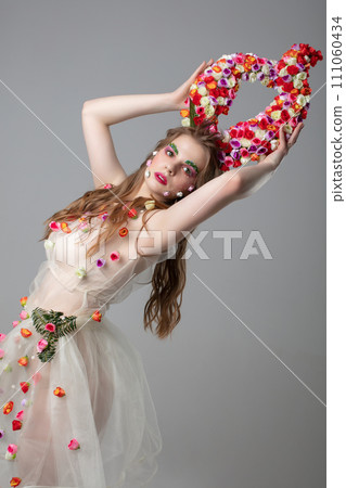 Portrait of a beautiful girl with creative make-up 111060434