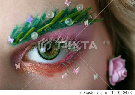 Portrait of a beautiful girl with creative make-up Portrait of a beautiful girl with creative make-up 111060458