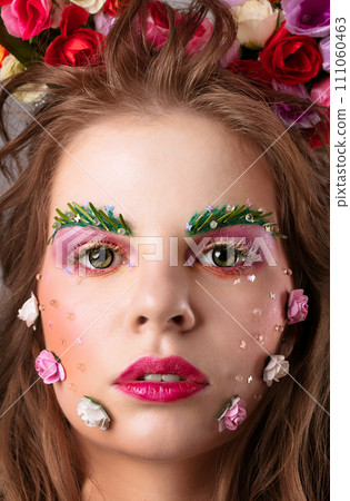 Portrait of a beautiful girl with creative make-up 111060463