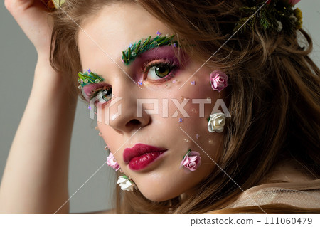 Portrait of a beautiful girl with creative make-up 111060479