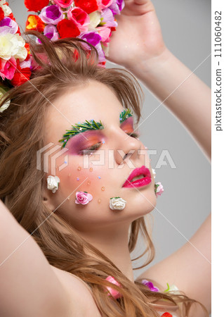 Portrait of a beautiful girl with creative make-up Portrait of a beautiful girl with creative make-up 111060482