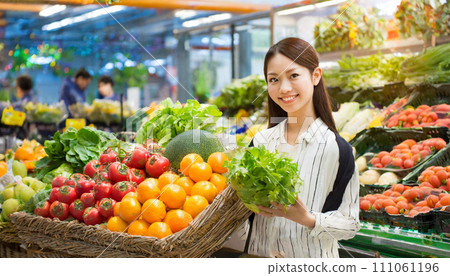 AI image of a woman shopping at a supermarket 111061196