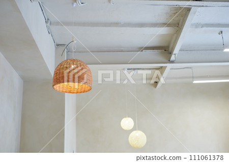 Large thatched ceiling lamp. Loft style. High ceilings with rails. Minimalism 111061378