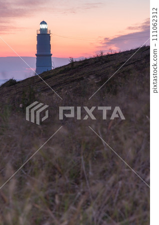Kakezuka Lighthouse stands at the mouth of the Tenryu River in Iwata City, Shizuoka Prefecture, Japan Kakezuka Lighthouse stands at the mouth of the Tenryu River in Iwata City, Shizuoka Prefecture, Japan 111062312