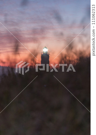 Kakezuka Lighthouse stands at the mouth of the Tenryu River in Iwata City, Shizuoka Prefecture, Japan 111062313