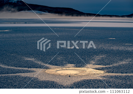 Pattern of a frozen lake. 111063112