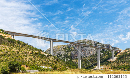 Huge bridge over the canyon of the Tara river in mountains of Montenegro Huge bridge over the canyon of the Tara river in mountains of Montenegro 111063133