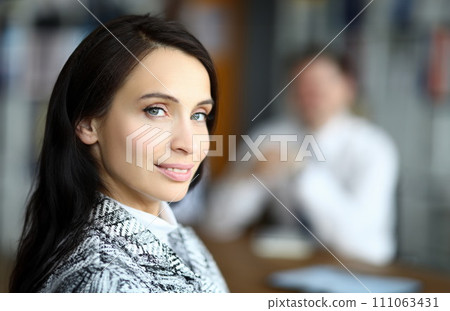 Smiling woman turned around in front her man Smiling woman turned around in front her man 111063431